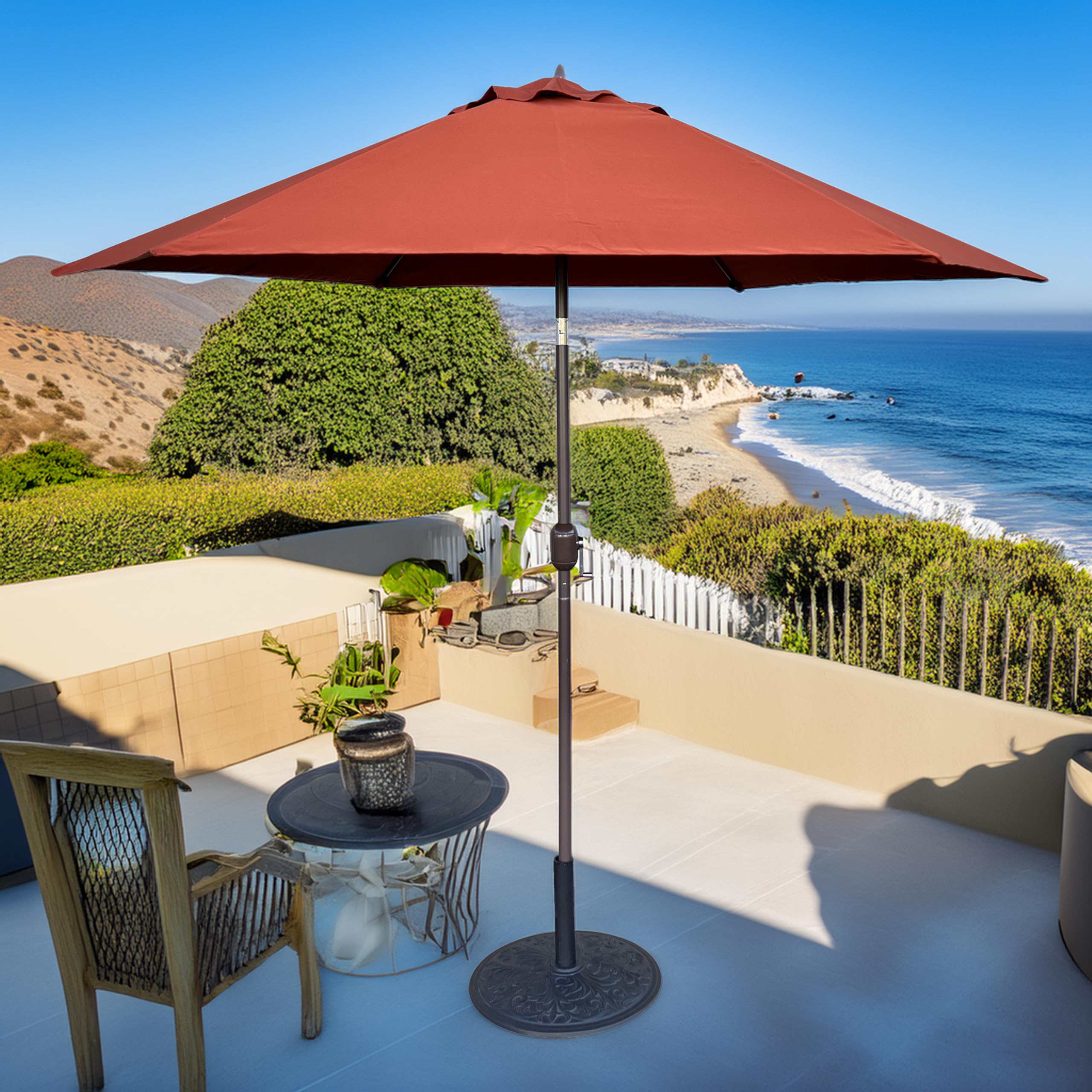 TropiShade umbrella over patio dining set showing comfortable shaded outdoor living