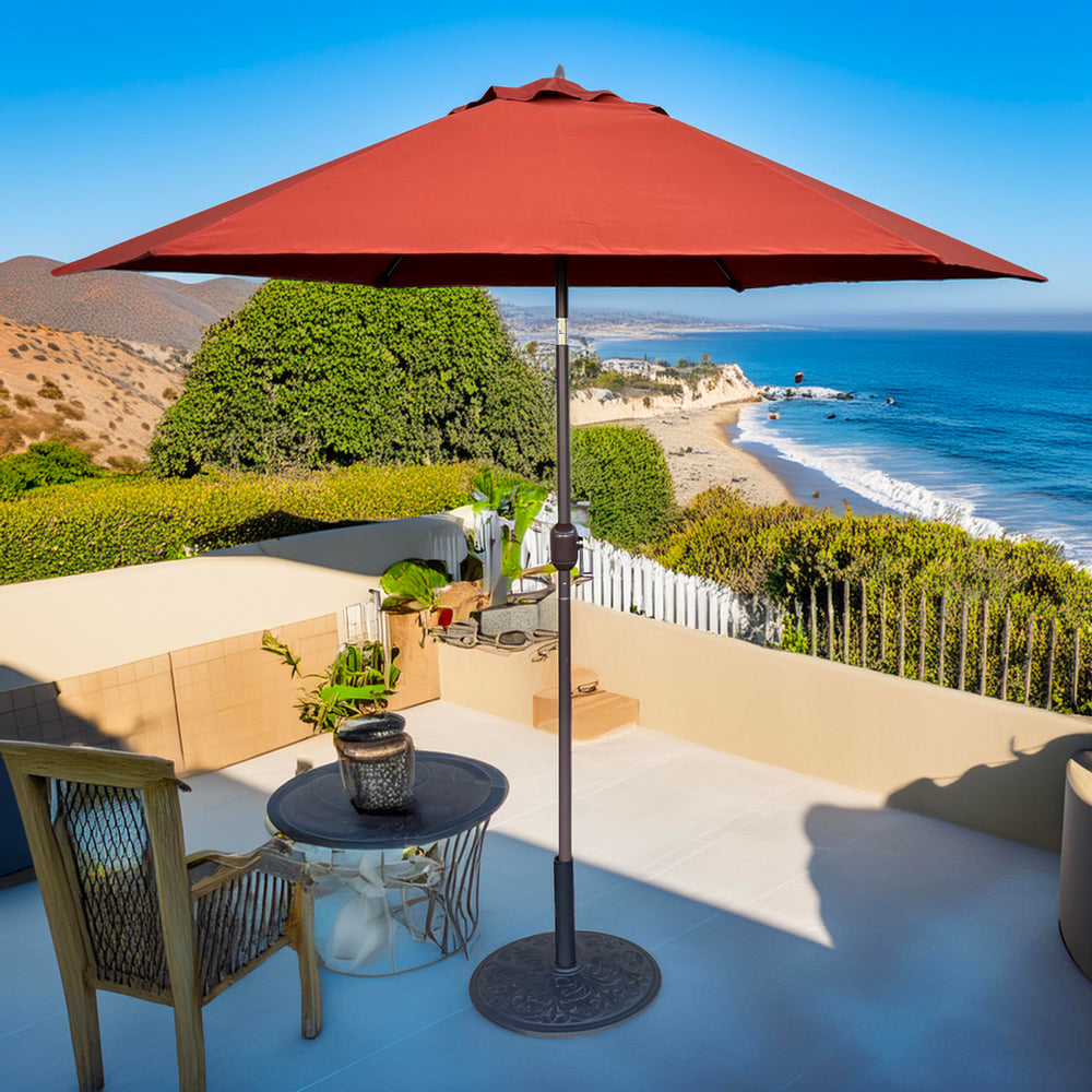 TropiShade umbrella over patio dining set showing comfortable shaded outdoor living