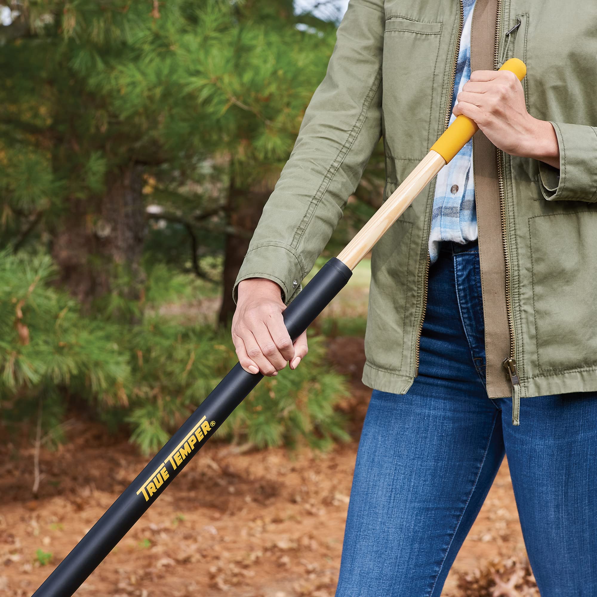 True Temper rake clearing leaves on lawn showing fast debris collection
