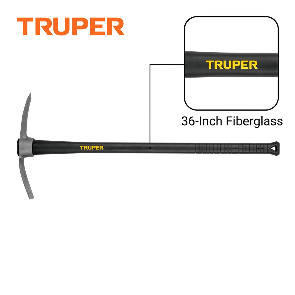 Truper mattock in use breaking compacted soil and cutting roots for fast progress