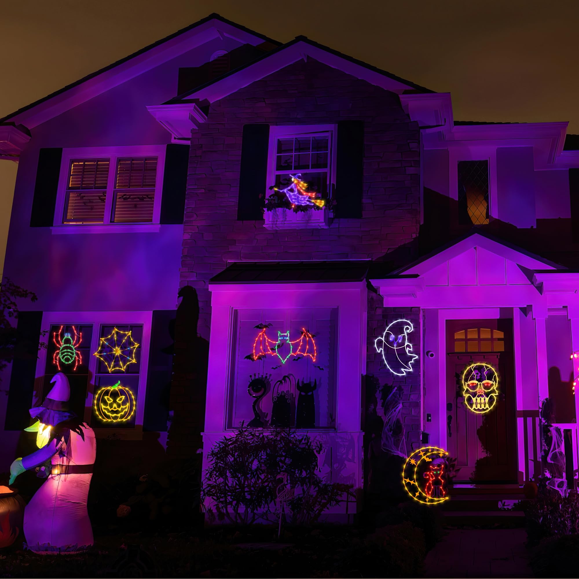 TRWYMZ ghost and spider silhouettes together in a window delivering spooky layered effects