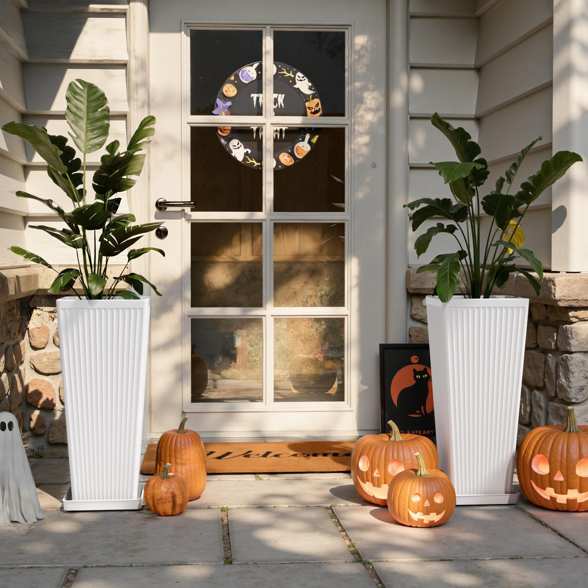 Trygoal planter holding a tall fern on patio for elevated outdoor style