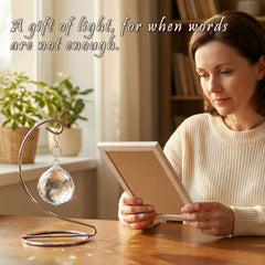 tuned wind in sunlit window casting colorful light across a living room wall
