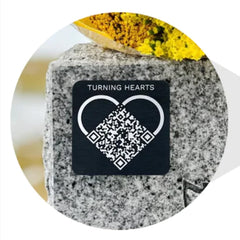 Turning Hearts front medallion showing QR code and clear link for visitors