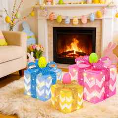 TURNMEON stacked gift boxes on mantel creating layered spring ambiance