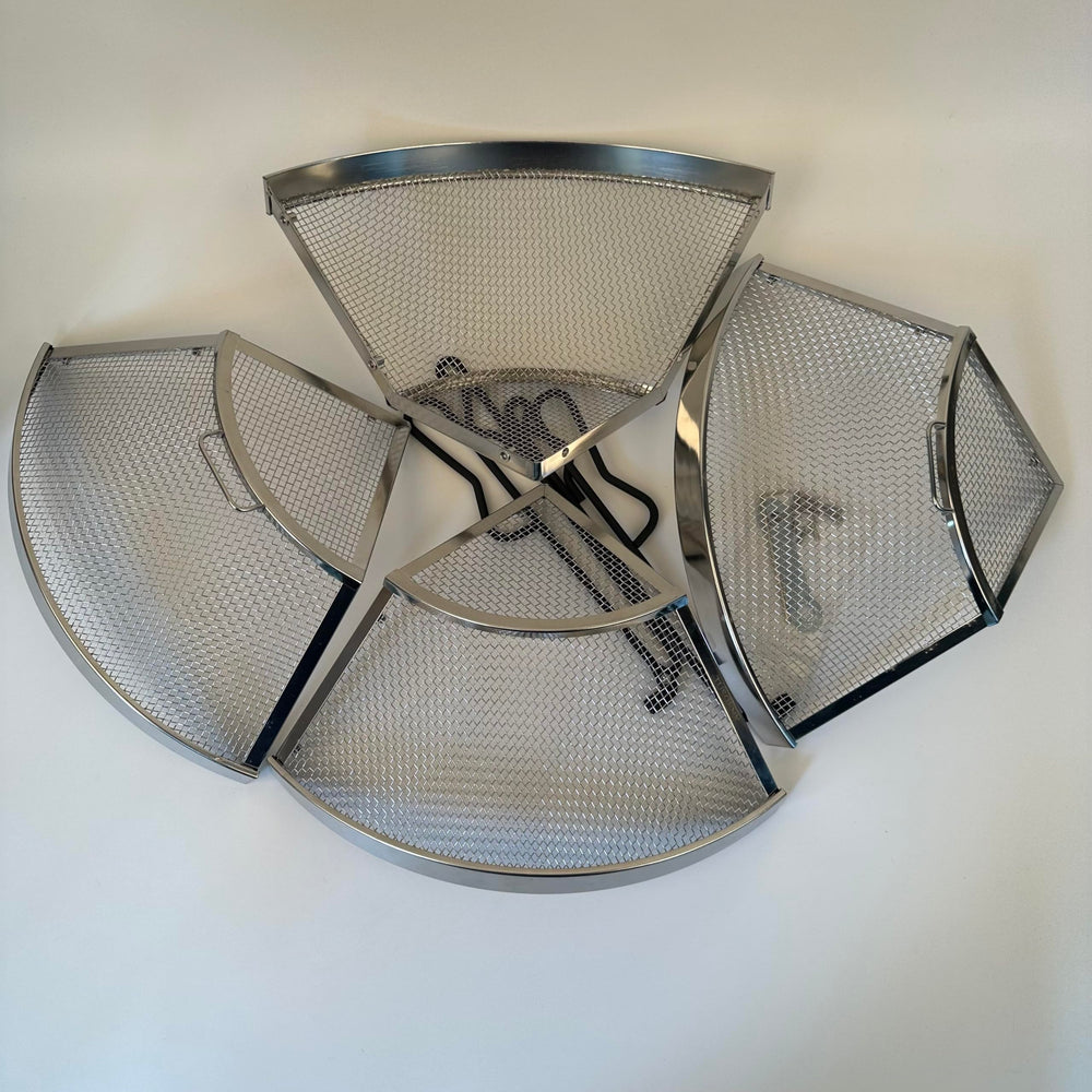 TUSGENK fully assembled at a campsite preserving views while containing sparks