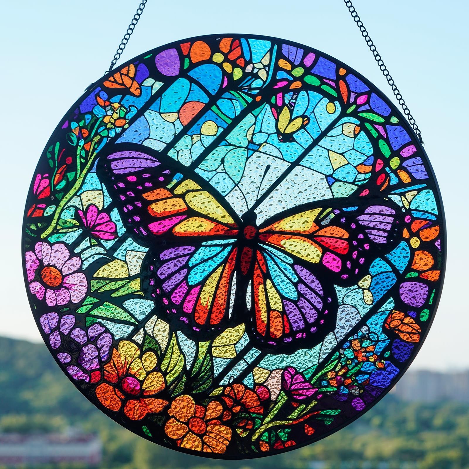 TwaliRay suncatcher in sunlit window creating warm colorful glow