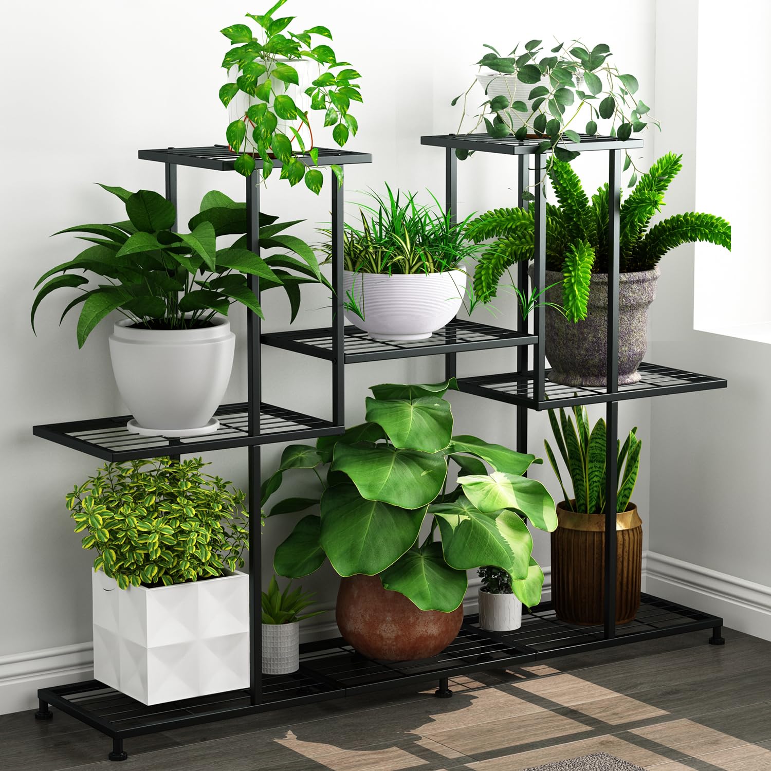 Twhep front view black metal plant stand showing organized multi-tier display and stability
