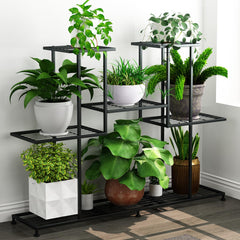 Twhep front view black metal plant stand showing organized multi-tier display and stability