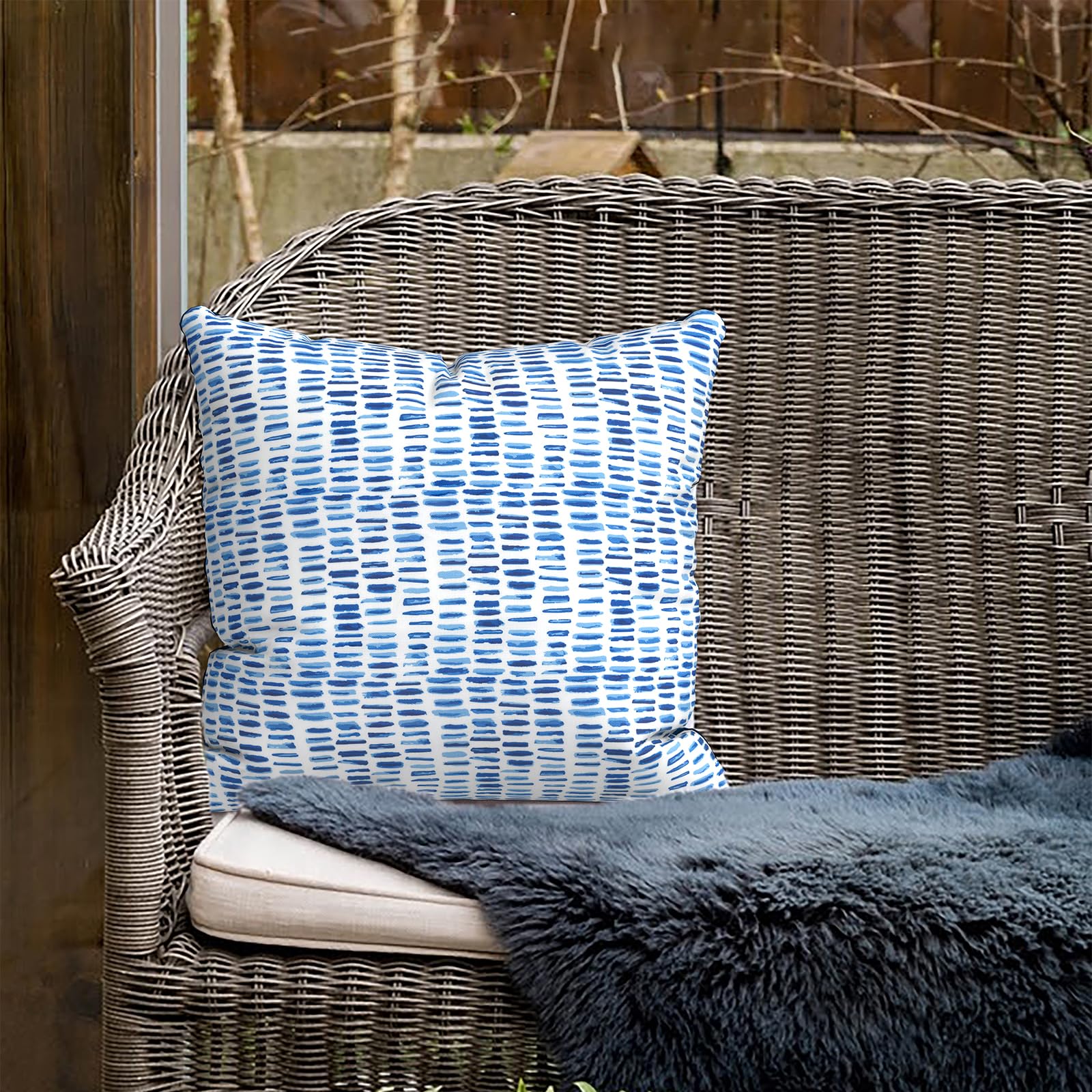 TWLEAR pillow beside chair for scale showing true 18x18 inch size
