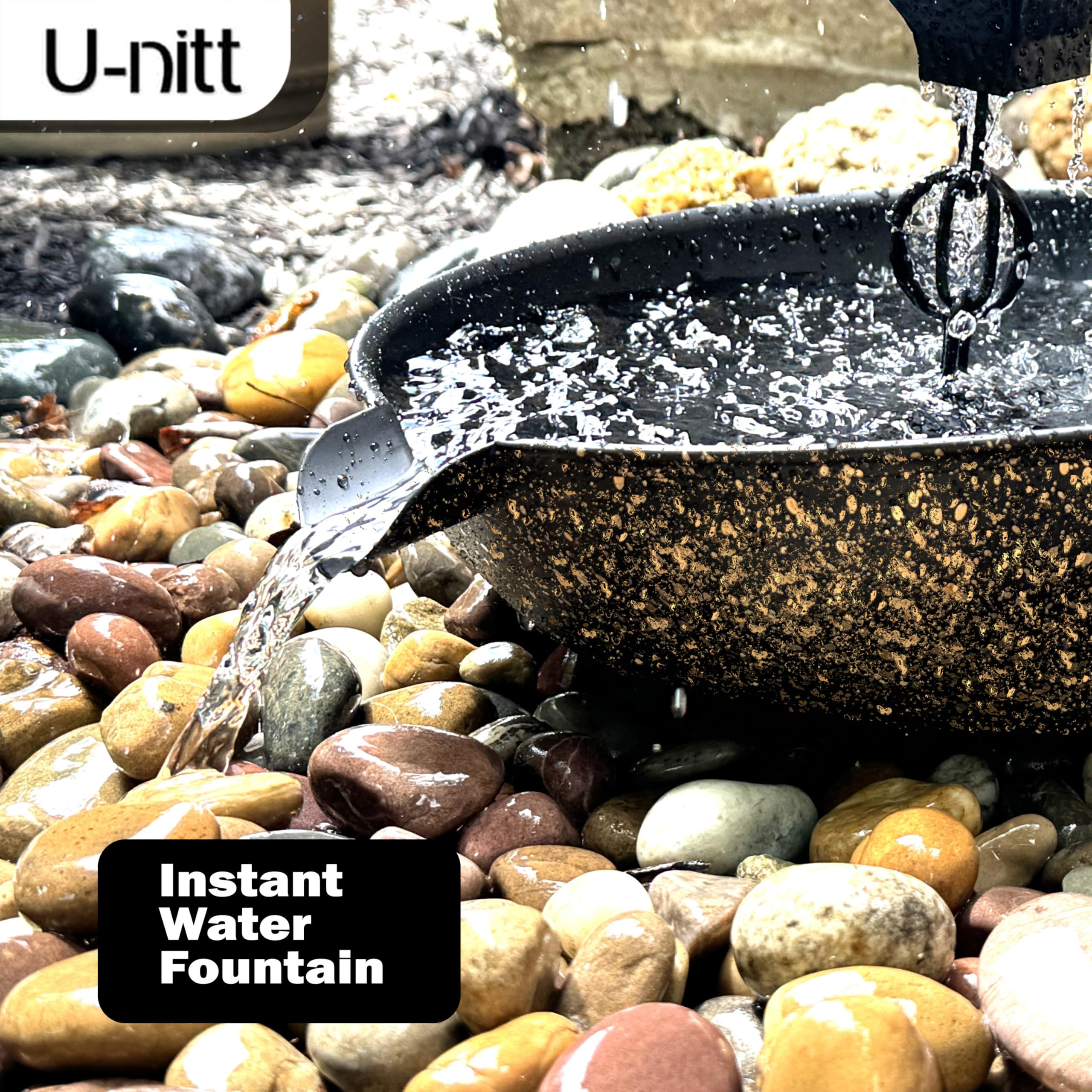 U-nitt basin installed under downspout anchoring rain chain and stabilizing flow