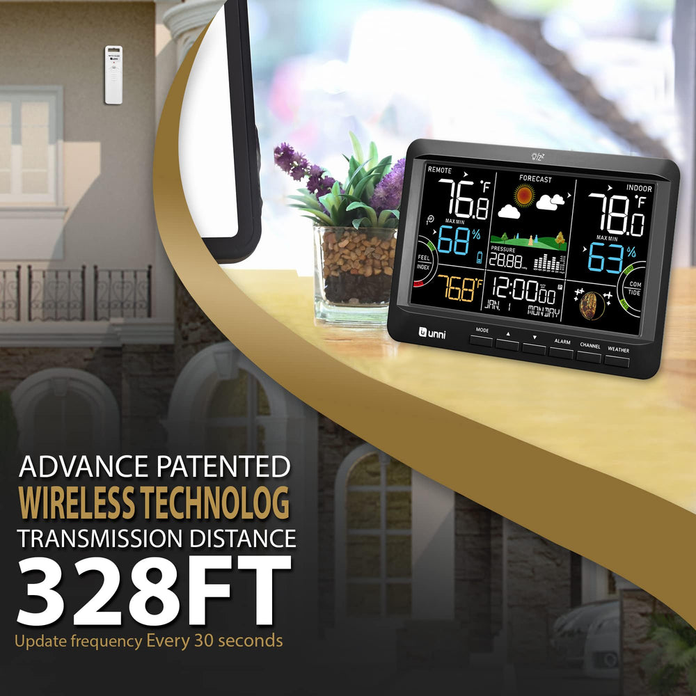 U UNNI weather station next to hand for size comparison and easy room readability