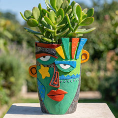 U WONDERFUL front view showing abstract face planter and bold colors enhancing decor