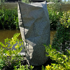 UB-STORE plant cover installed over garden shrub protecting from frost