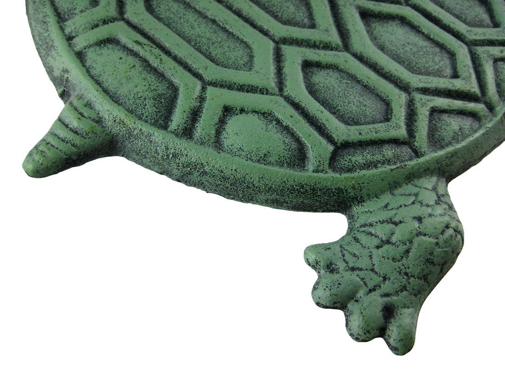 UD turtle next to a ruler demonstrating 13 by 9 inch size for scale and placement