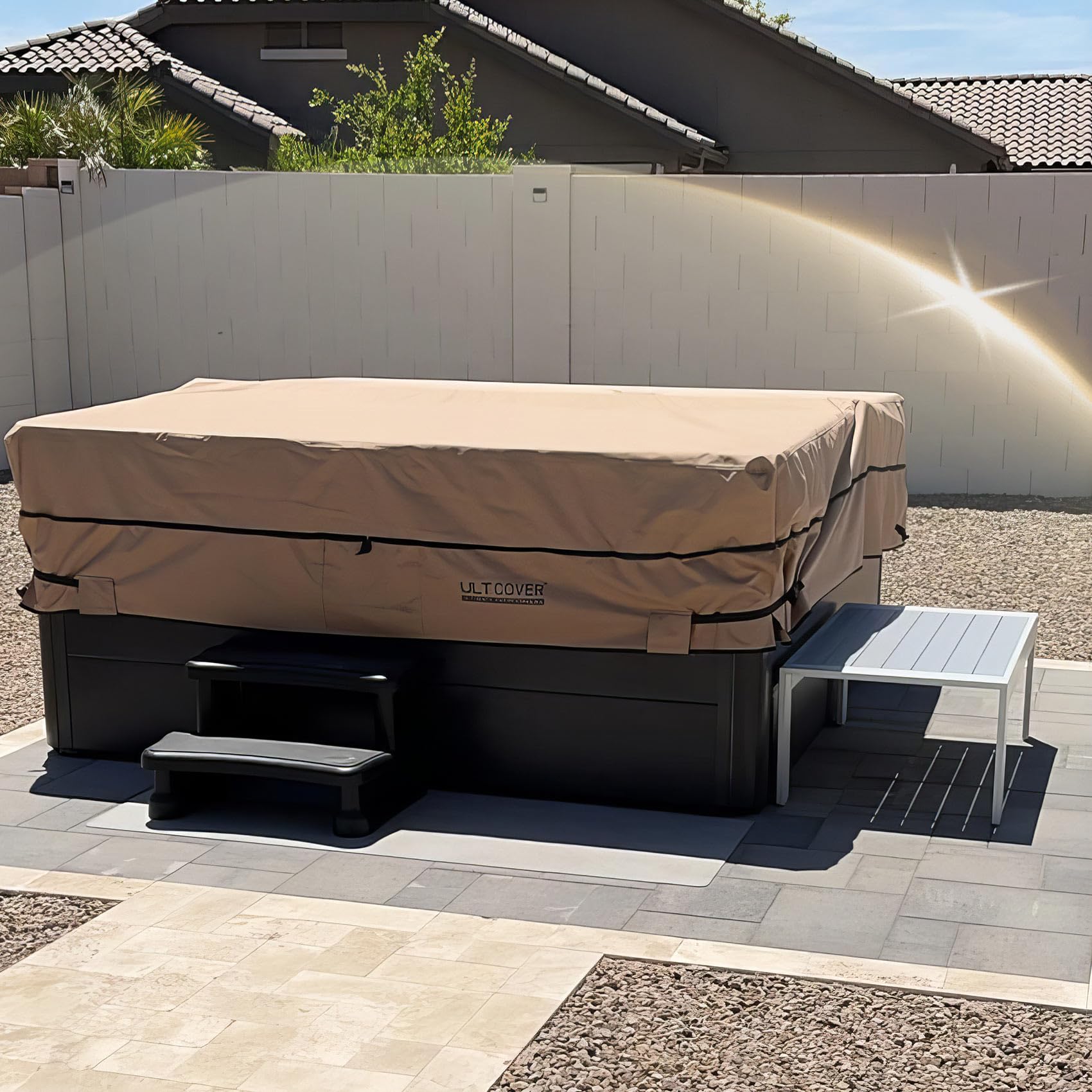 ULTCOVER installed on square hot tub demonstrating full coverage and debris protection