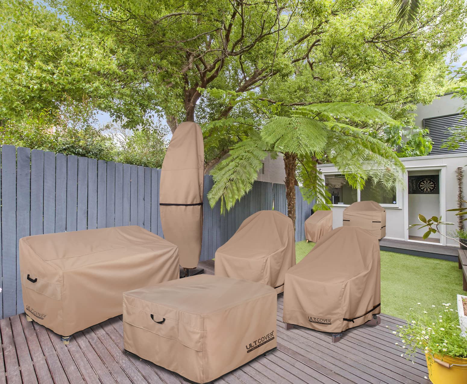 ULTCOVER lifestyle backyard setting with cover on fire table for seasonal protection