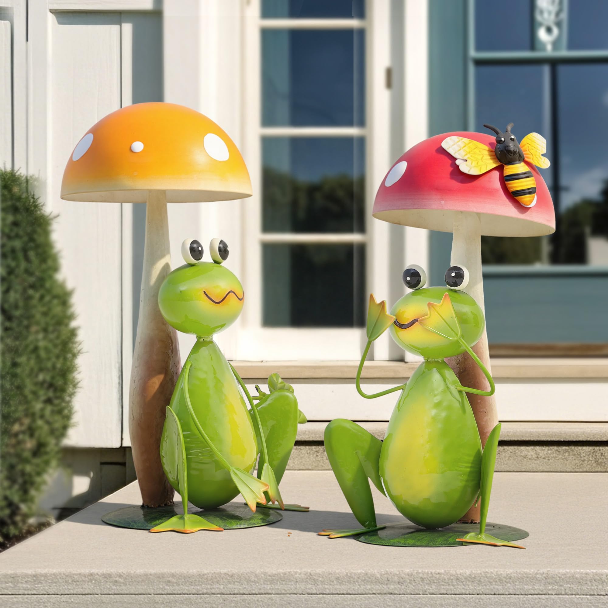 Ultym in-garden styling with frogs among flowers adding focal interest