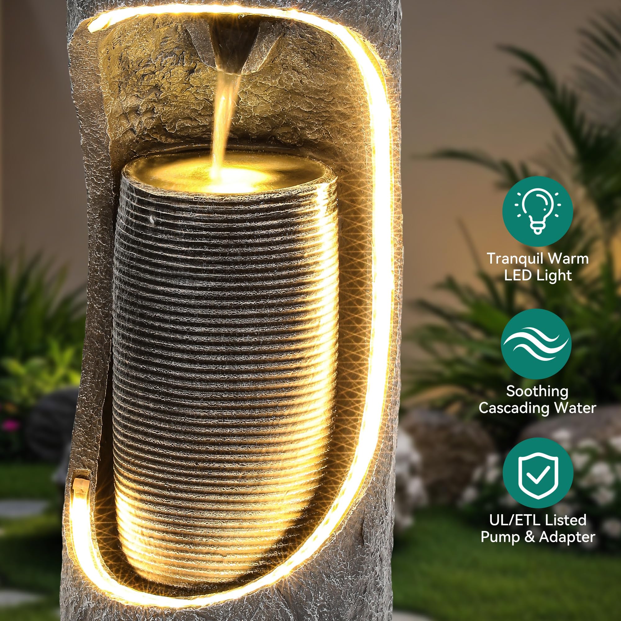 Ultym fountain lit by LED strips creating warm atmospheric night glow