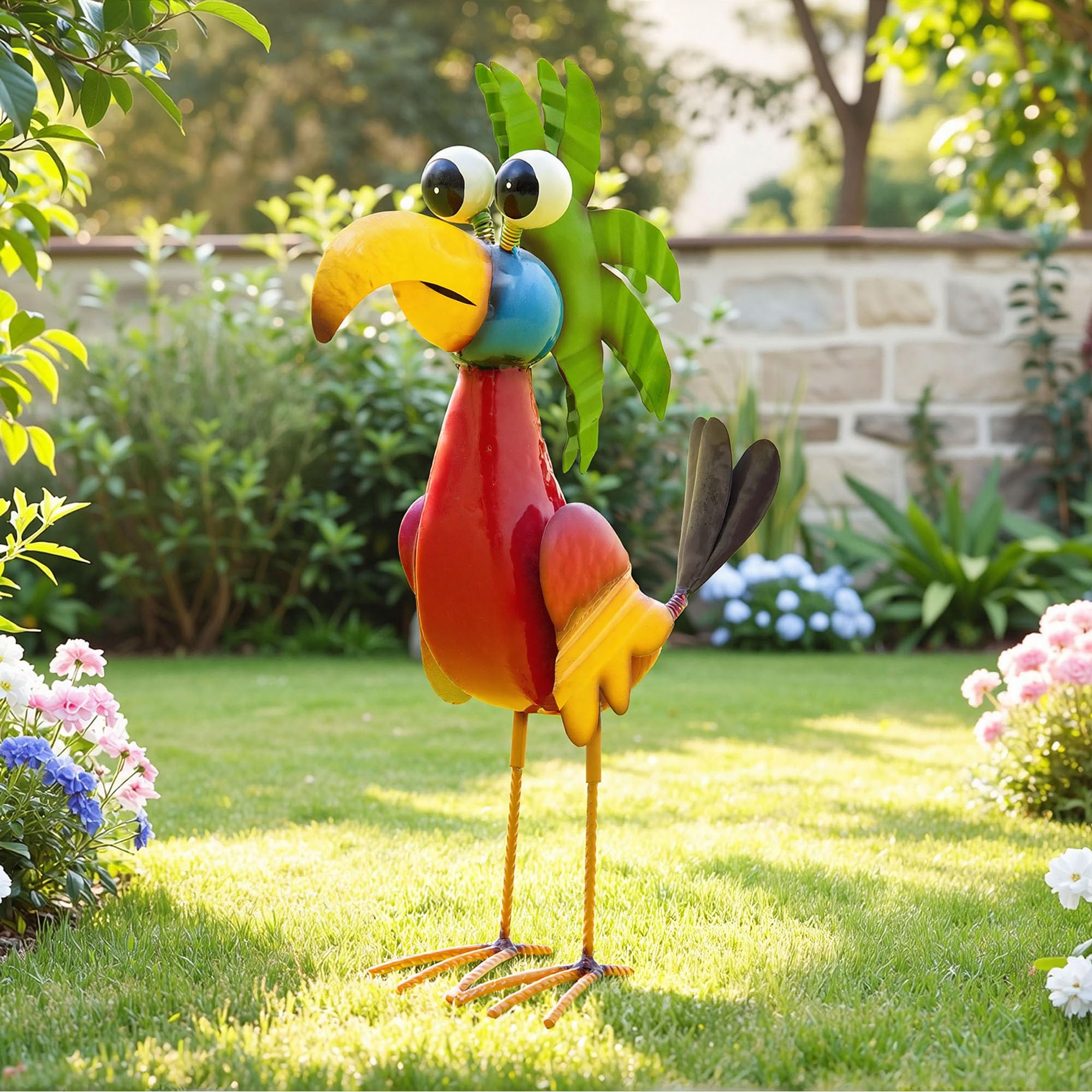 Ultym metal parrot placed in a flower bed adding tropical color and focal interest