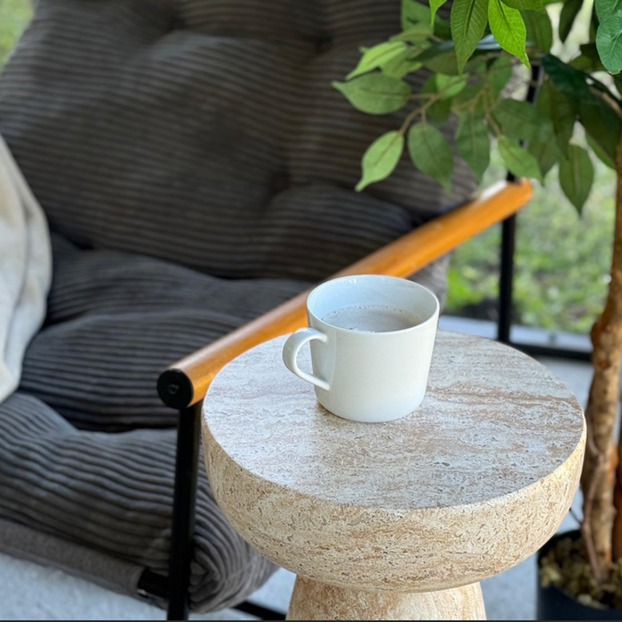Ultym on a patio demonstrating outdoor use and weather resistance