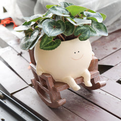 UMESONG front view smiling face planter highlighting cheerful decor benefit