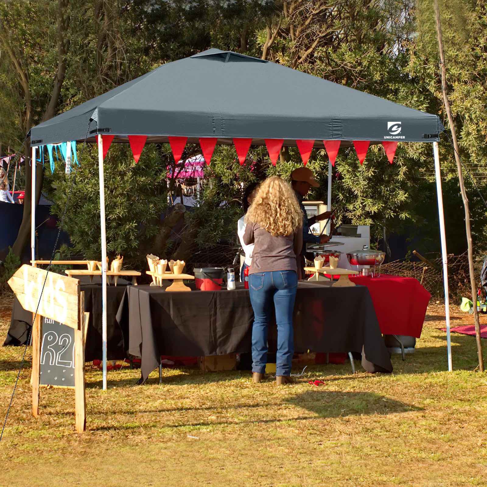 UNICAMPER toldo en evento al aire libre, ambiente protegido y cómodo