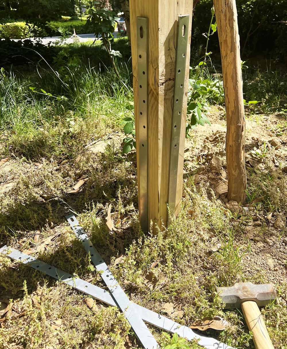 UniExtra pack of four stakes laid out illustrating parts supplied and value