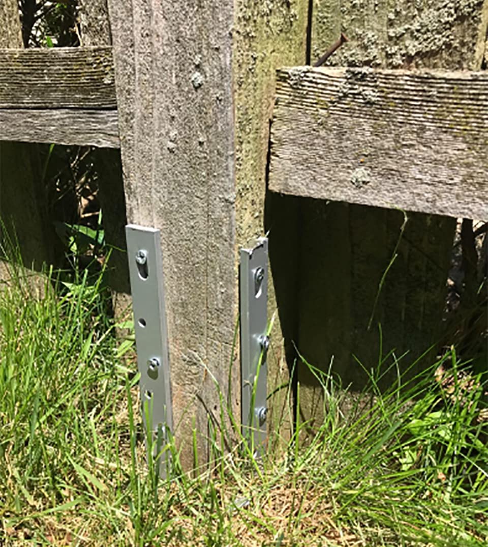 UniExtra repaired fence in garden showing restored post and saved landscaping