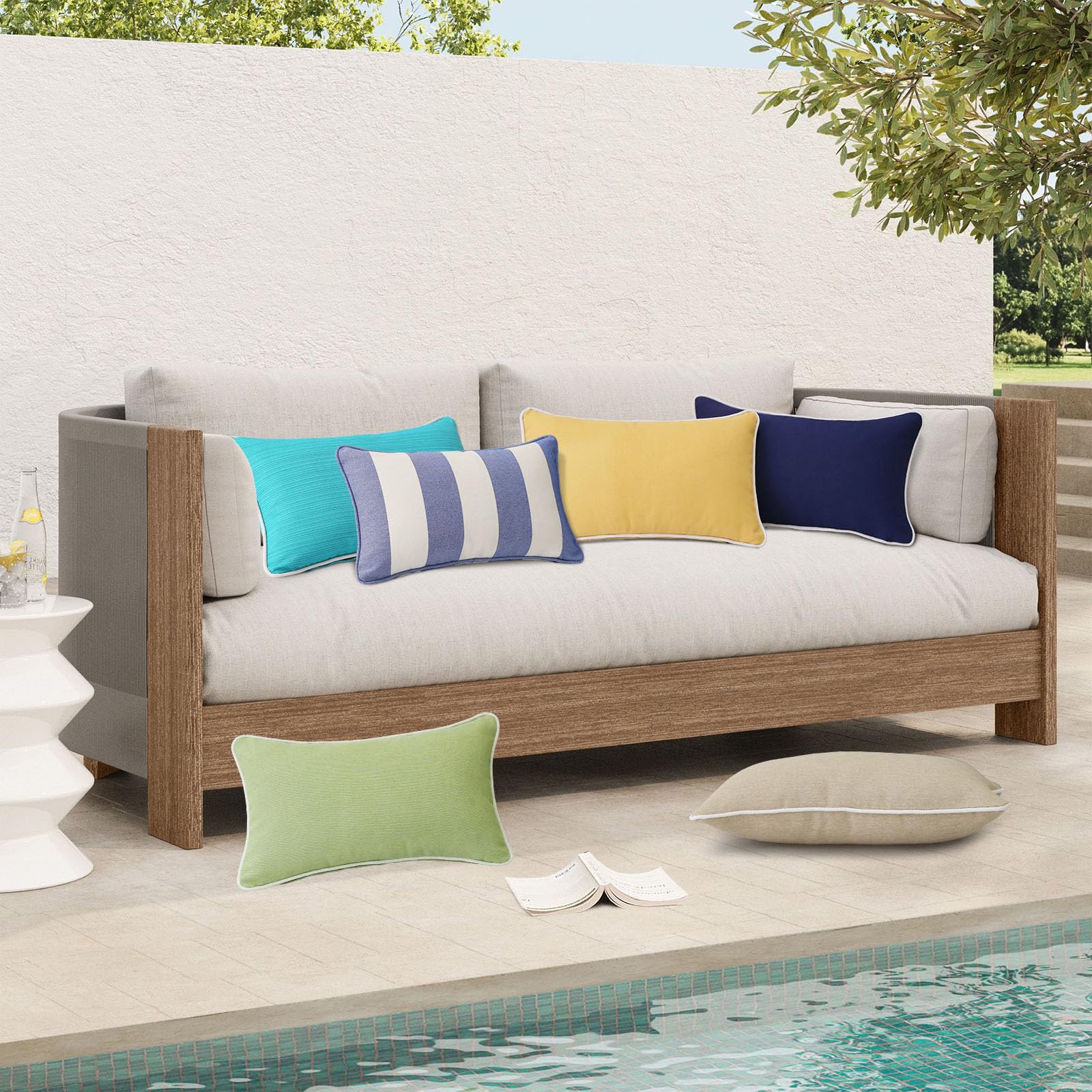 Unimatta pillows styled on patio bench showing durable outdoor decor benefit