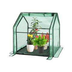 U'Artlines front view of compact greenhouse showing protected plants and space saving
