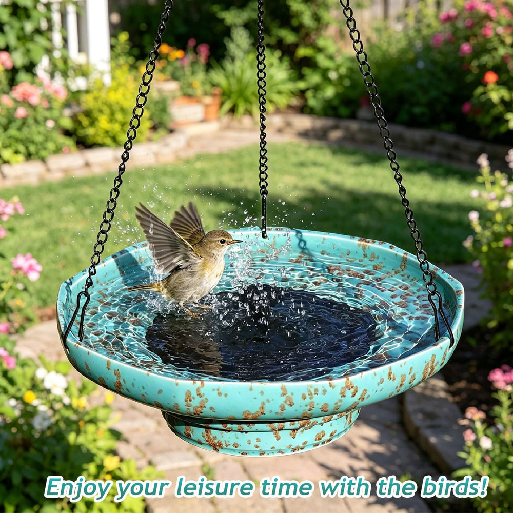 UPSJYJ bird bath held in hand to show 11.6 inch diameter and portable size for placement