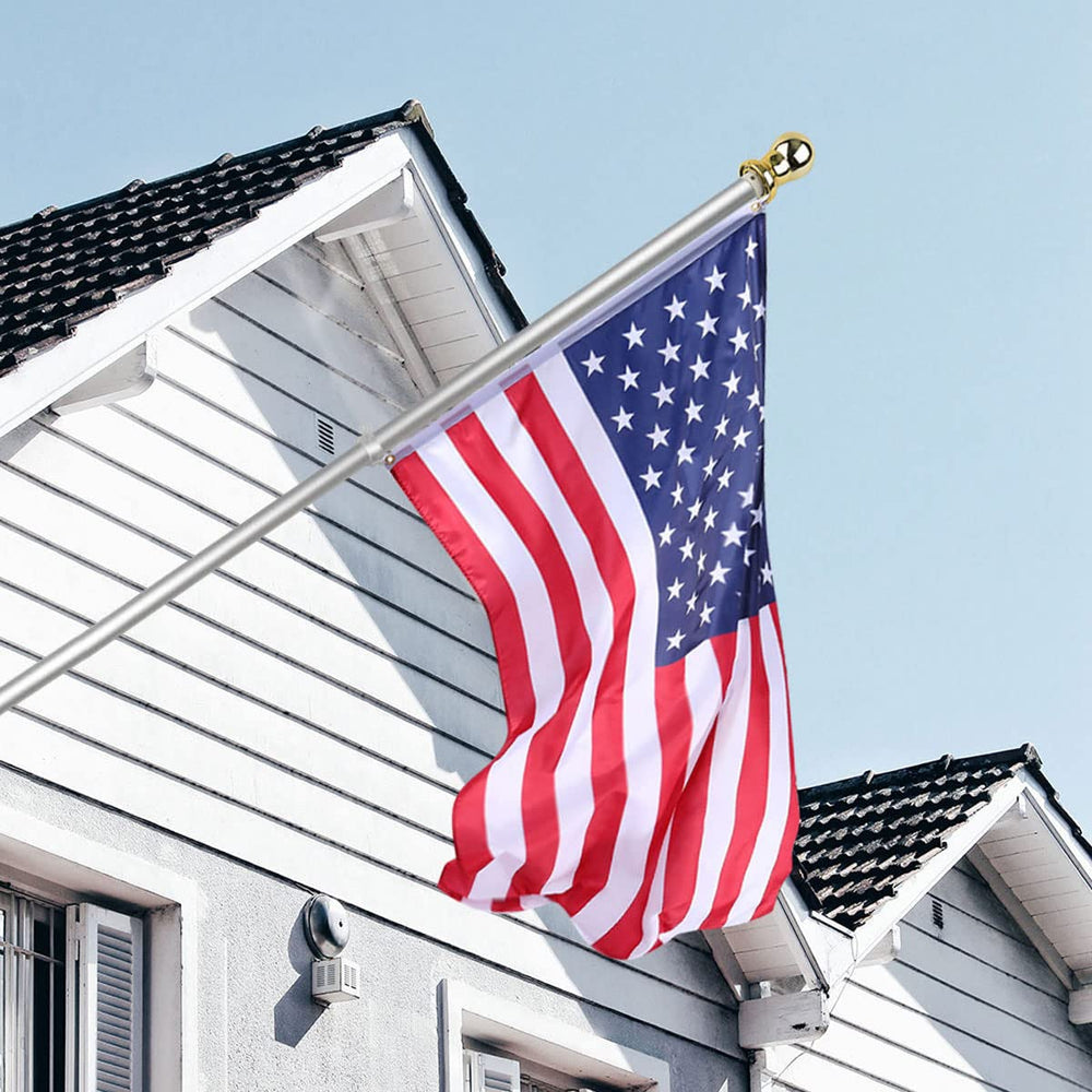 USA Flag Co. pole installed at a storefront showing professional flag presentation for businesses