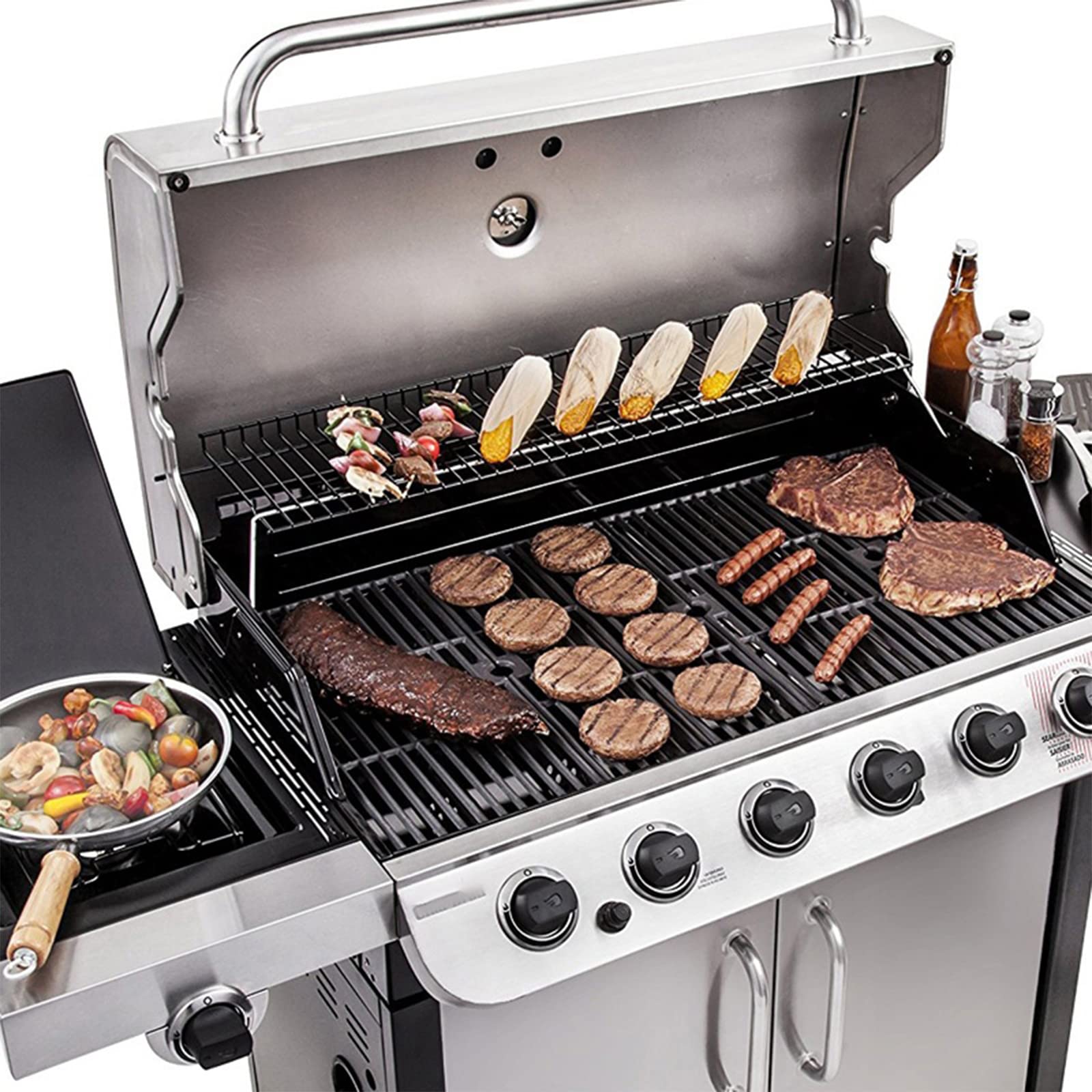 Utheer cleaning and seasoning tools beside grate showing easy maintenance routine