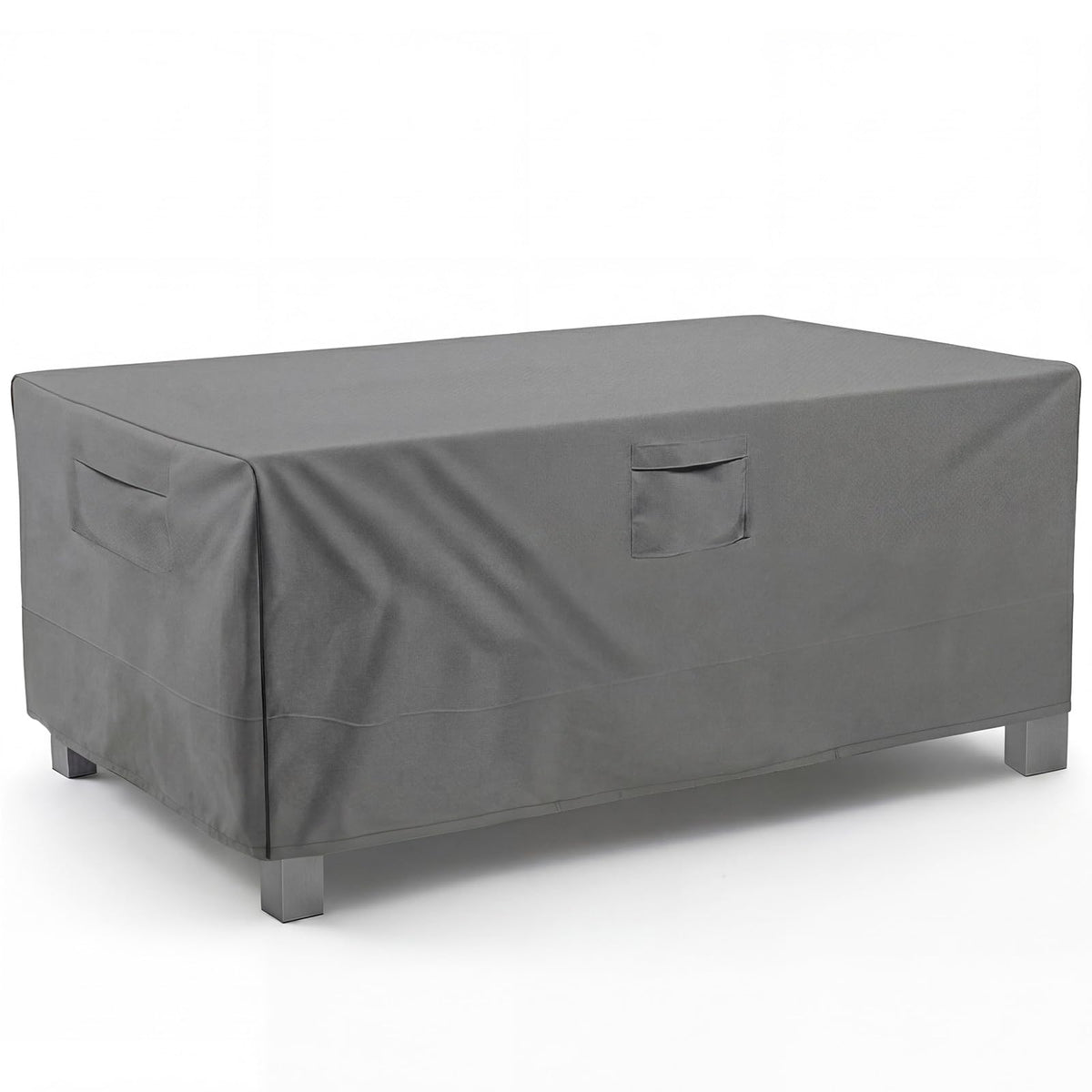 Vailge front view of rectangular cover protecting a patio table, shows full coverage benefit
