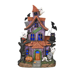 Valery Madelyn front view showing haunted house glowing on mantel