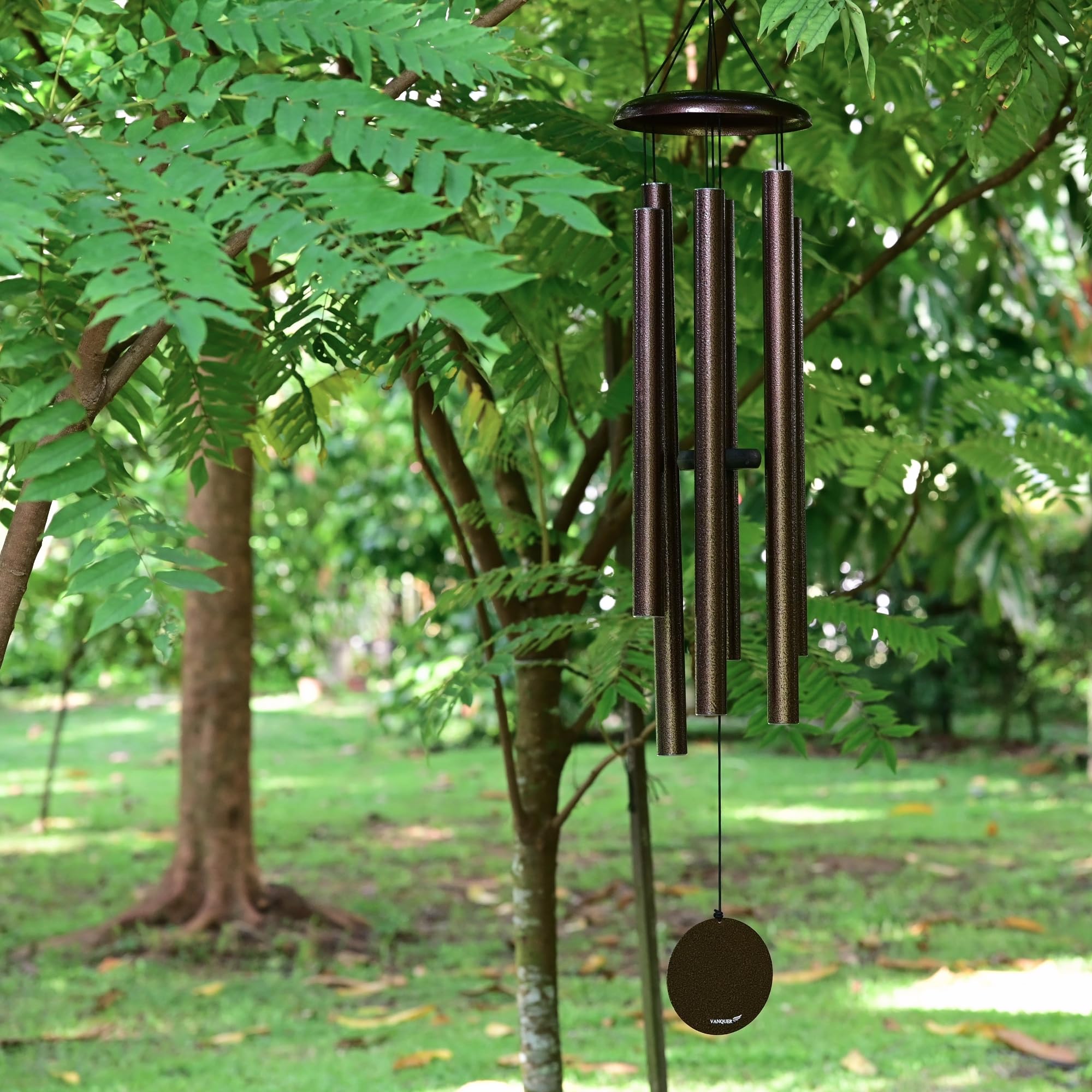 Vanquer wind chime in garden memorial setting offering soothing remembrance tones