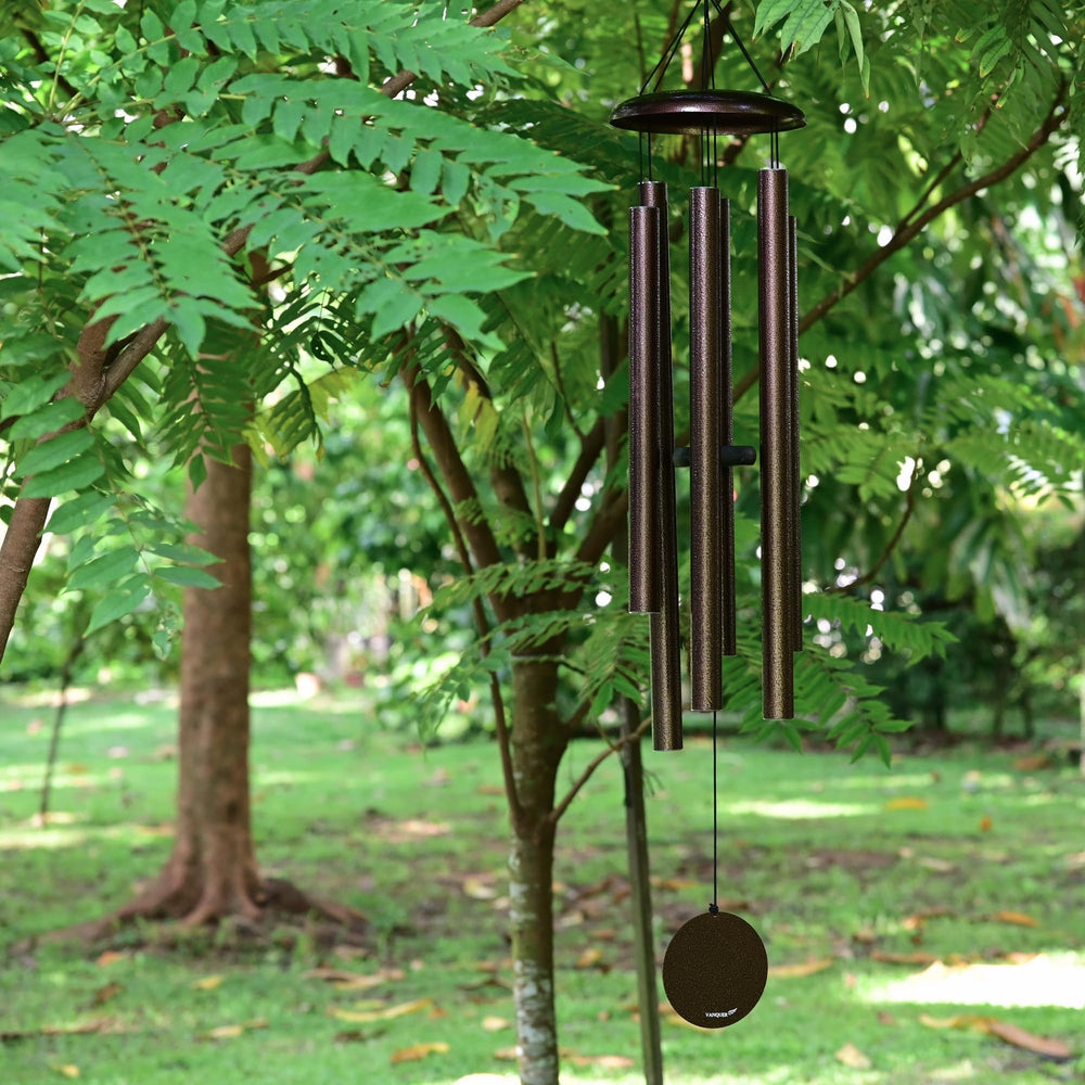 Vanquer wind chime in garden memorial setting offering soothing remembrance tones