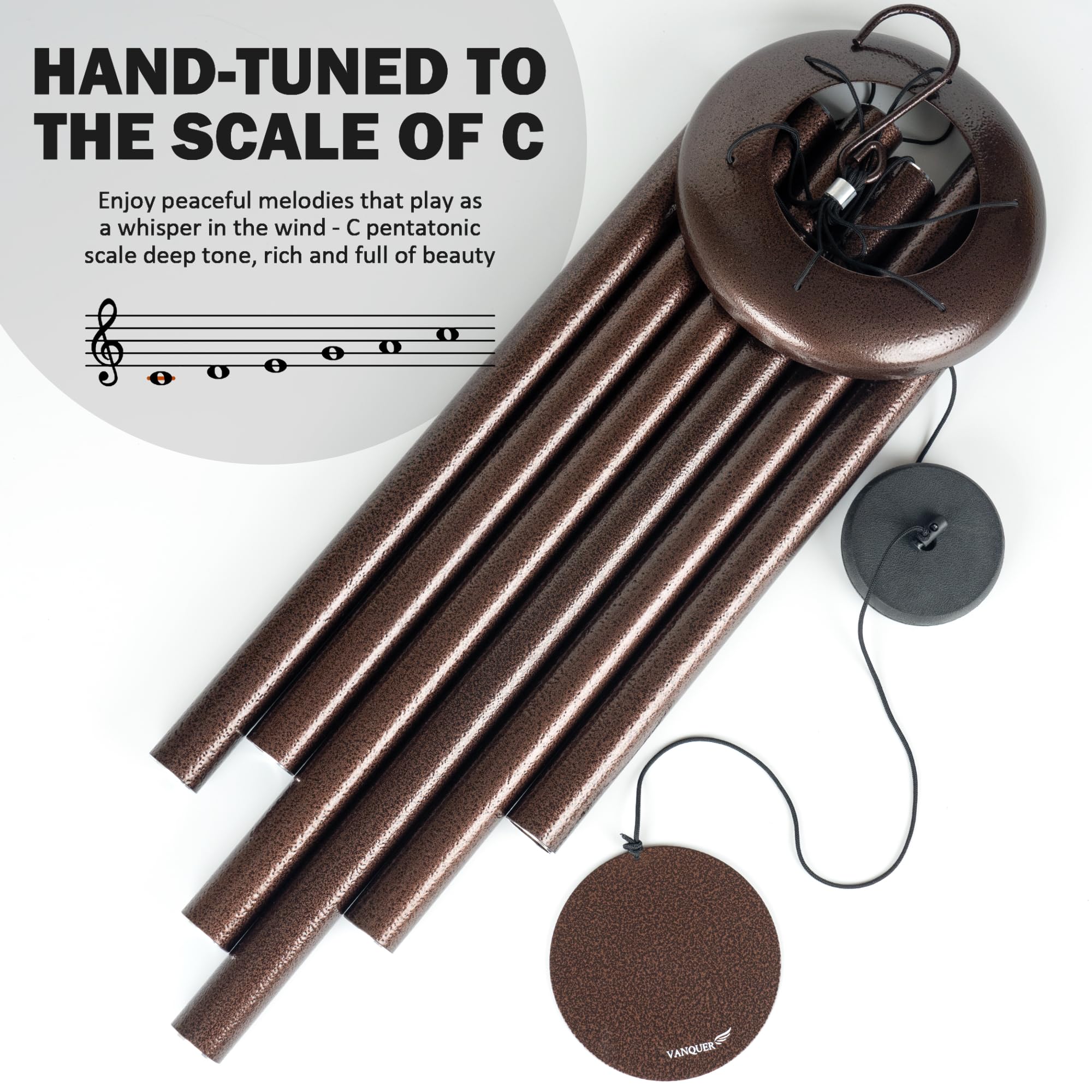 Vanquer wind chime size comparison next to chair demonstrating scale and presence