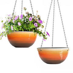 Vanslogreen front view orange planter enhancing curb appeal