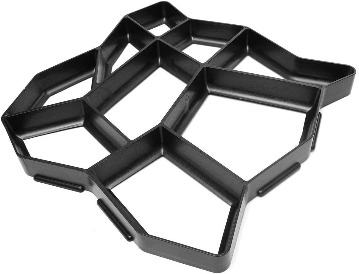 VanSmaGo hands demolding a cured stepping stone demonstrating easy release and clean edges