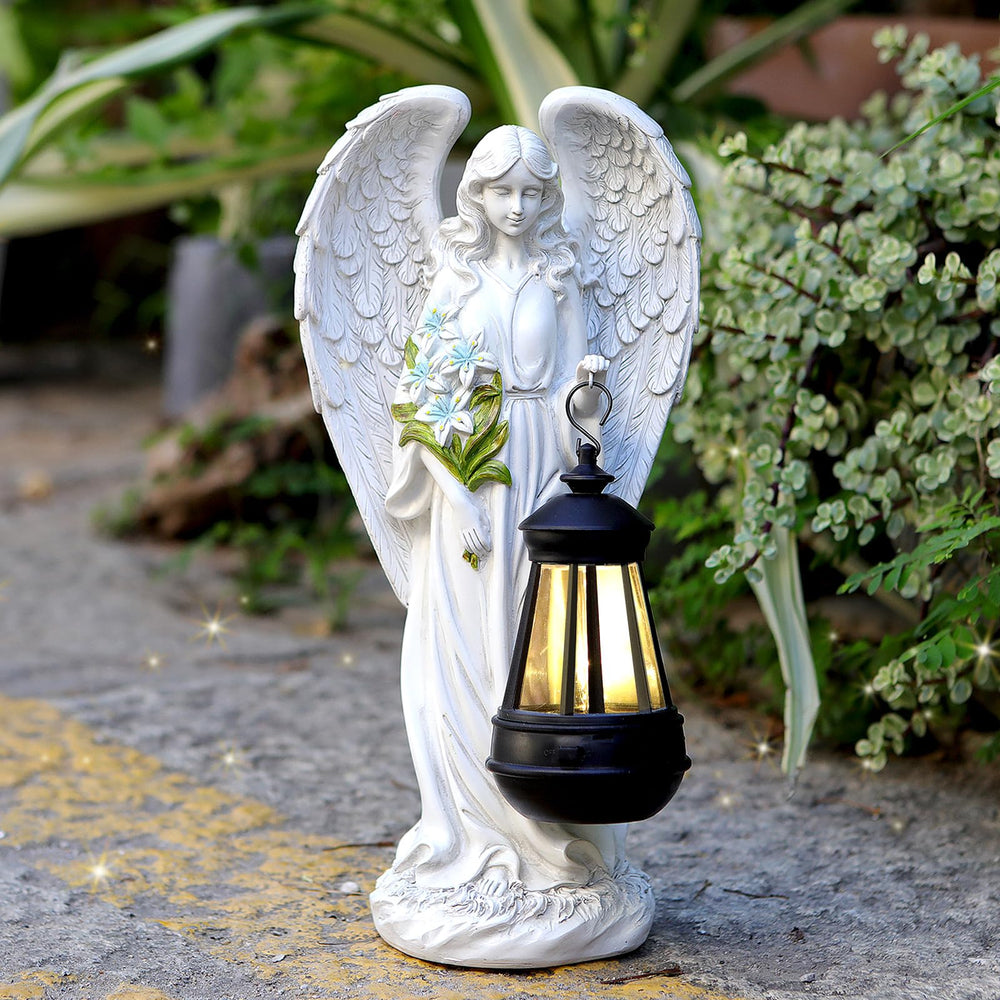 VChymm solar angel front view showing statue and soothing glow