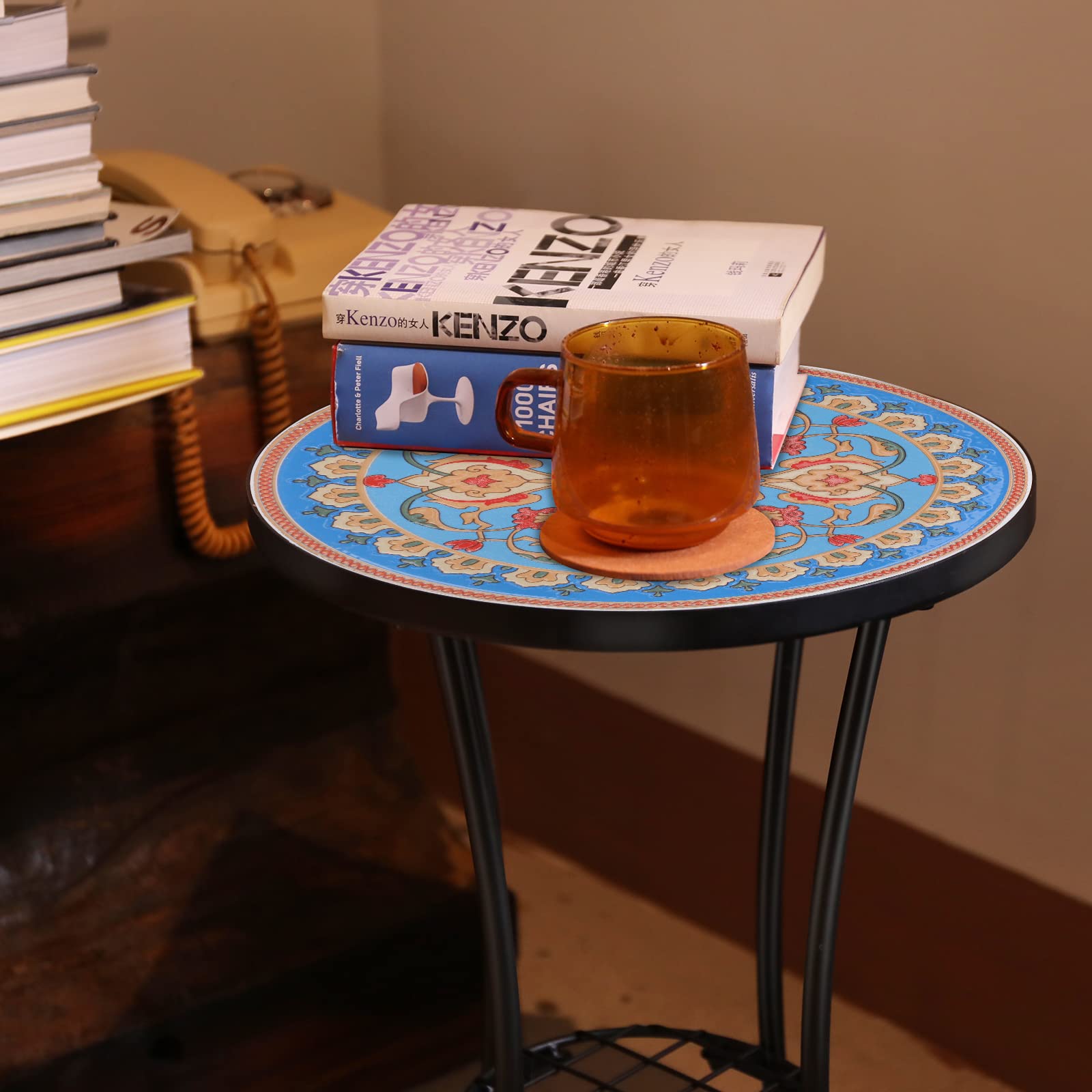 VCUTEKA table with drink and book in use, provides a steady surface outdoors