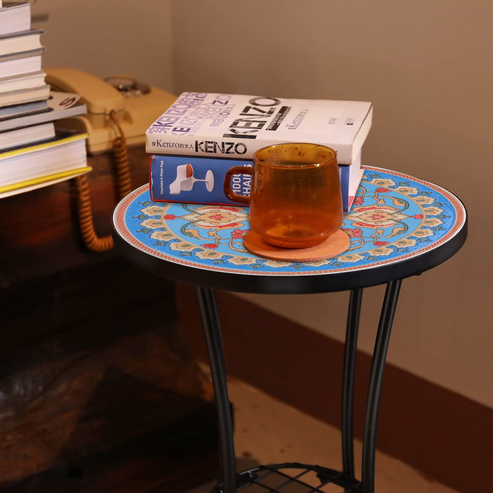 VCUTEKA table with drink and book in use, provides a steady surface outdoors