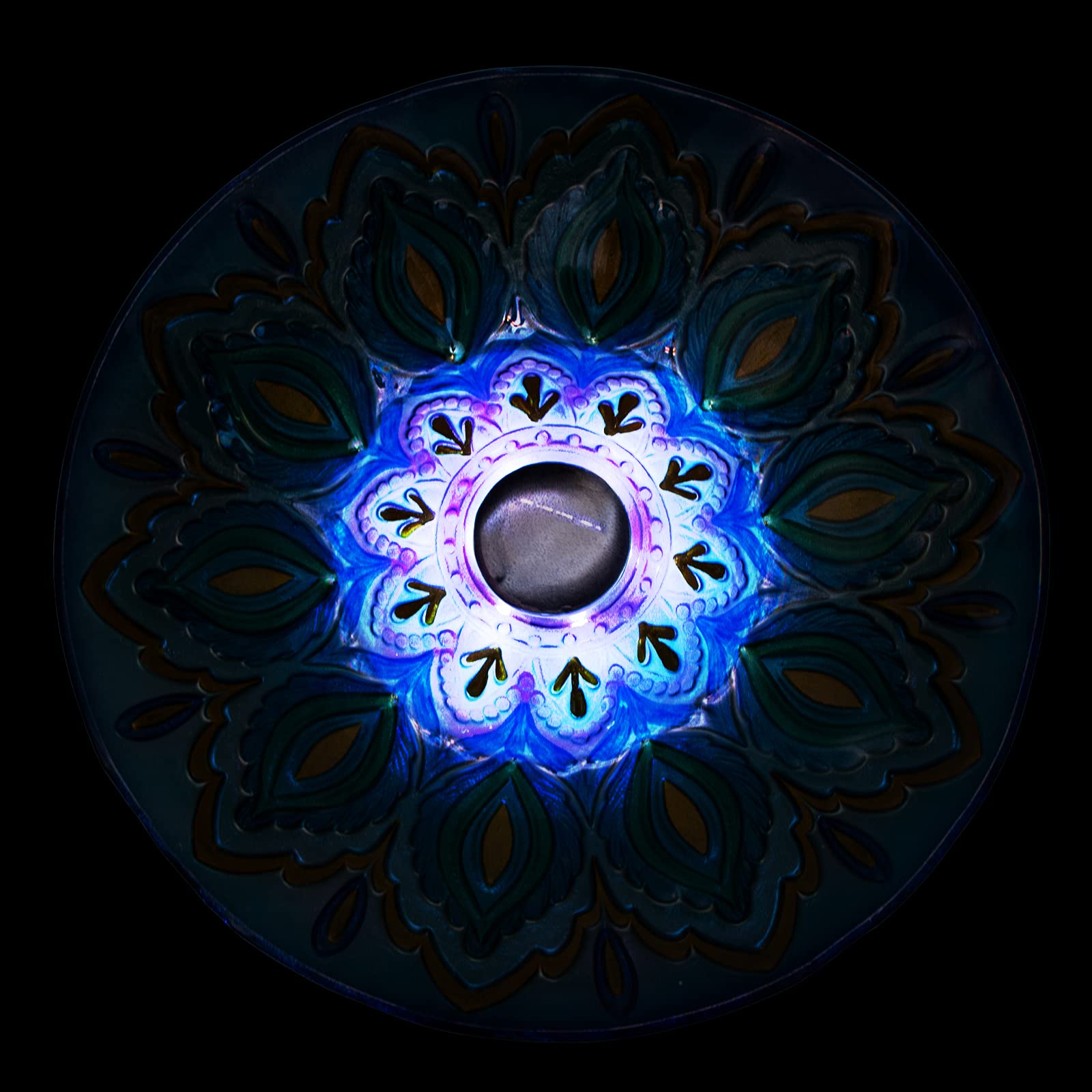 VCUTEKA nighttime image with soft solar glow adding ambient garden lighting benefit