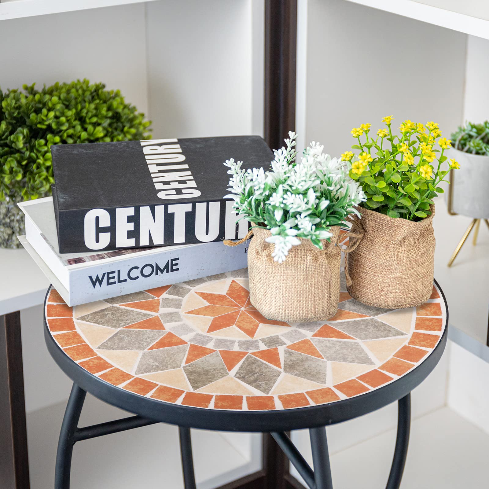 VCUTEKA styled on a balcony demonstrating compact size and decorative appeal