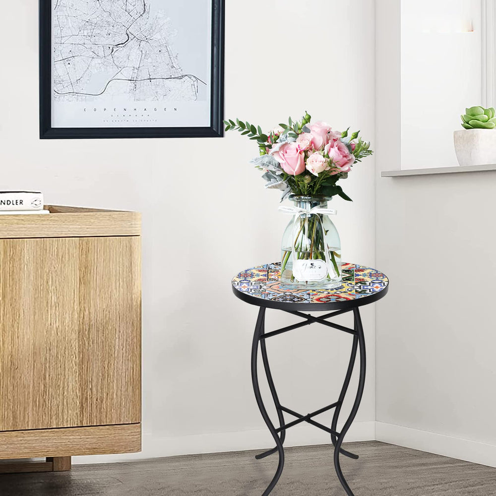 VCUTEKA tabletop staged with drinks and book demonstrating practical surface for patios