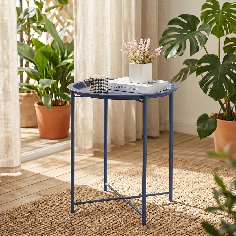 VECELO table next to sofa demonstrating size and everyday use