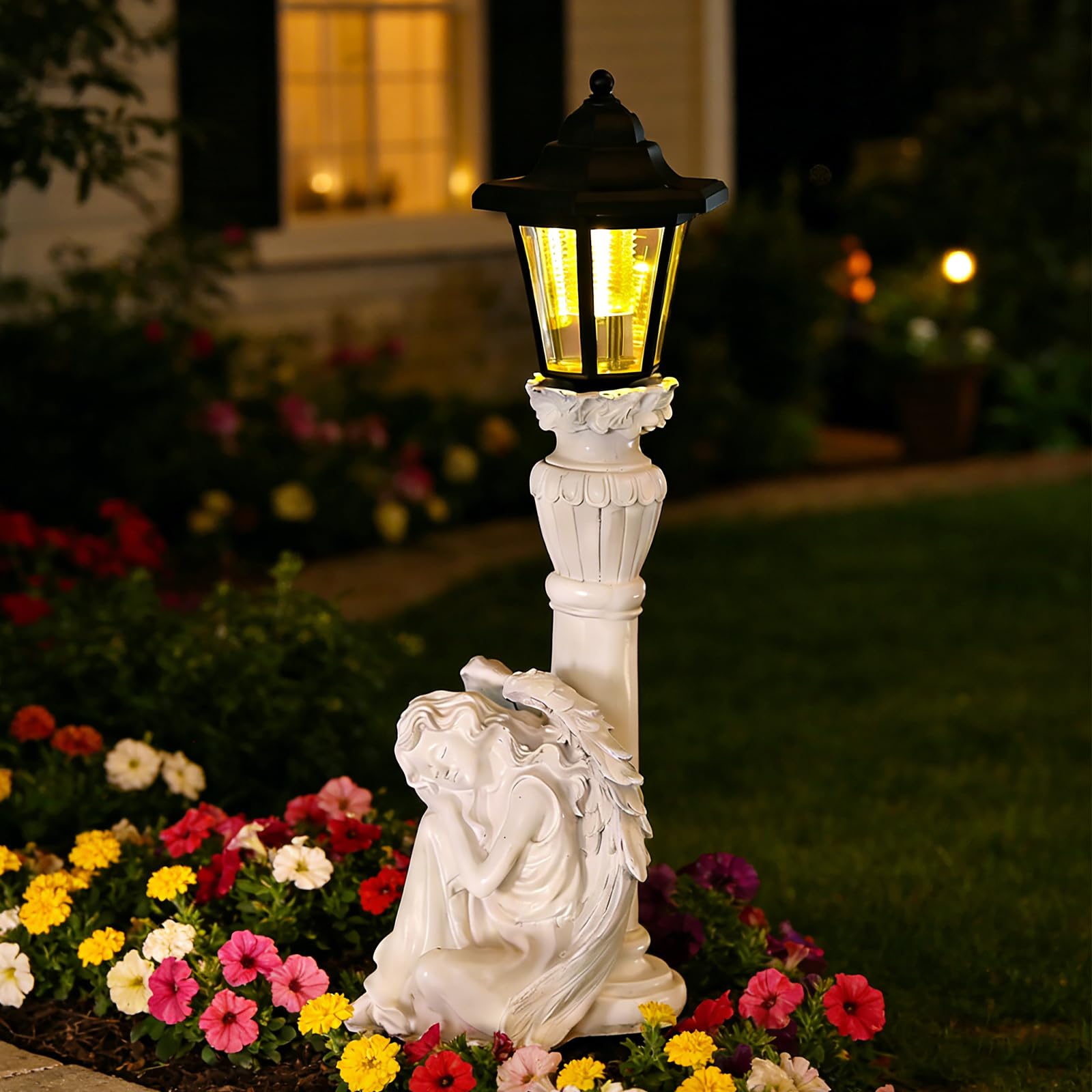 VEEKI angel front view showing elegant statue and solar lantern benefit ambiance