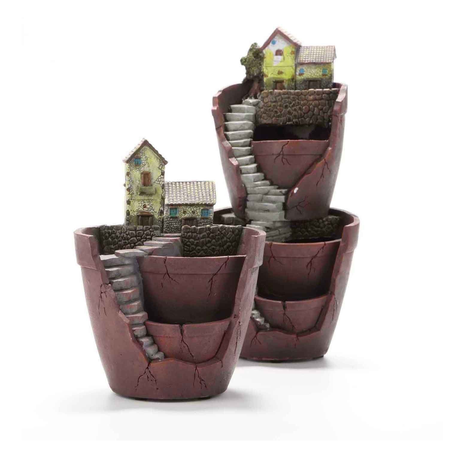 Vencer City of Sky beside a coffee mug to show size and tabletop scale for small spaces